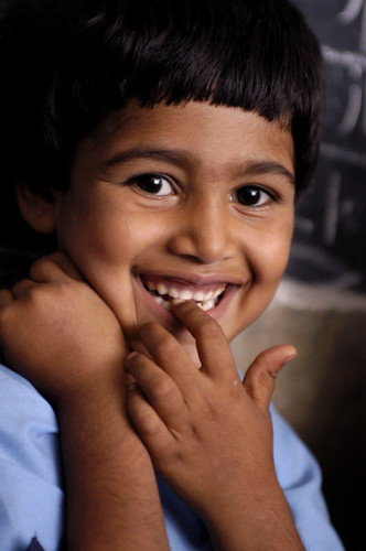Aarav smiling at school